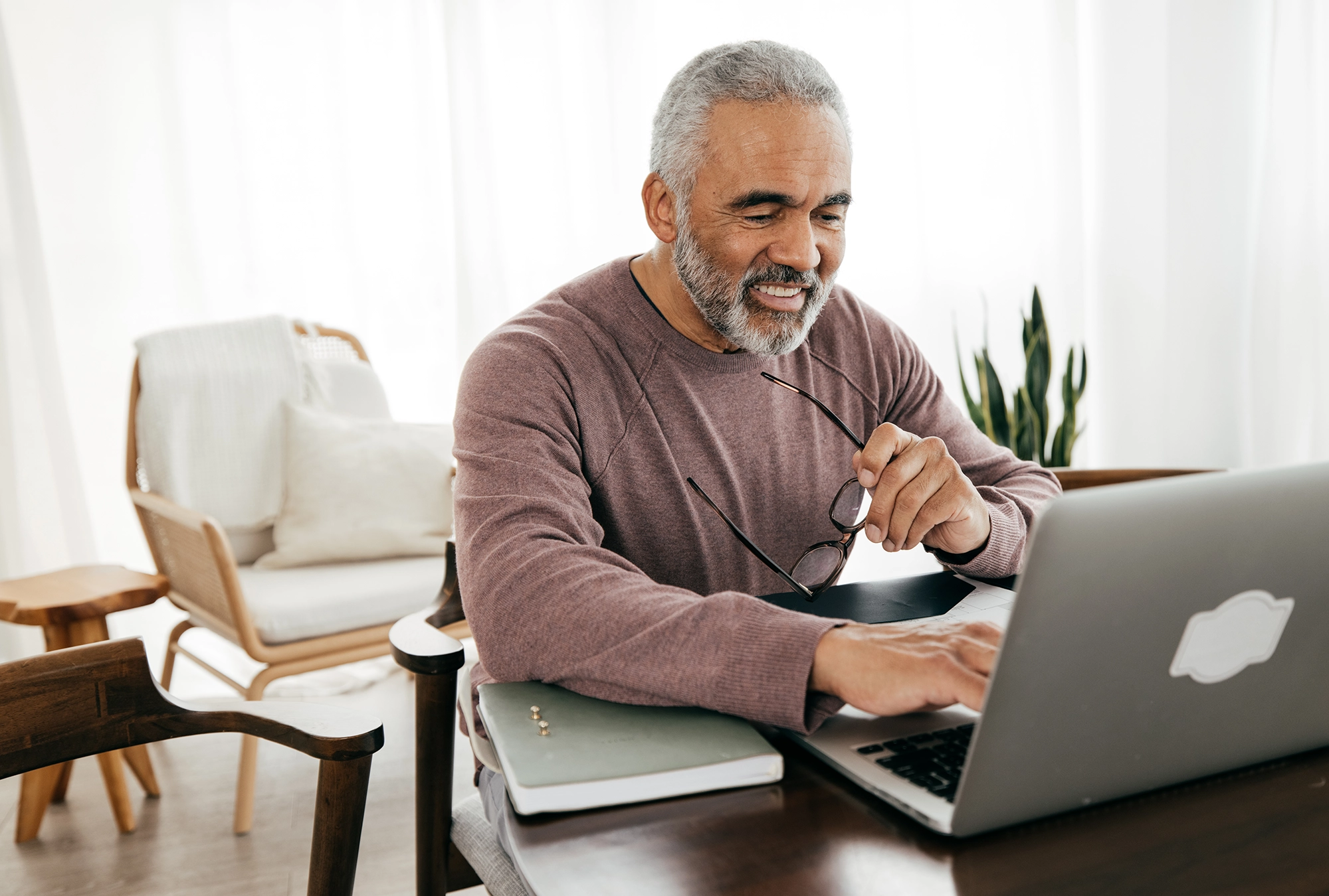 Man Reviewing Qualified Charitable Distribution rules