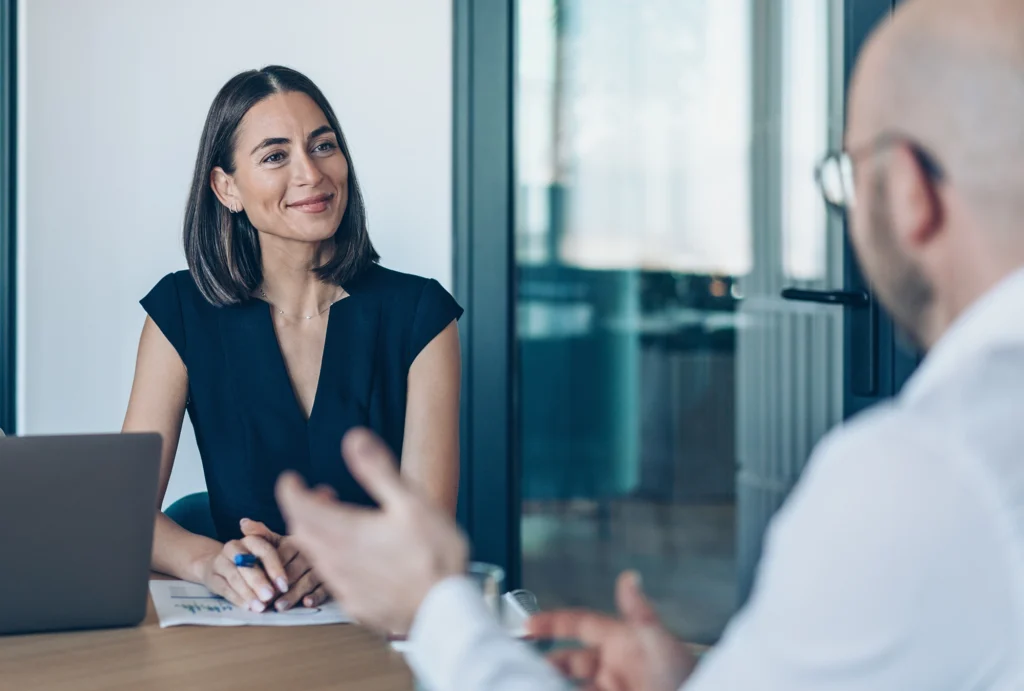 man meeting with a financial advisor in conference room