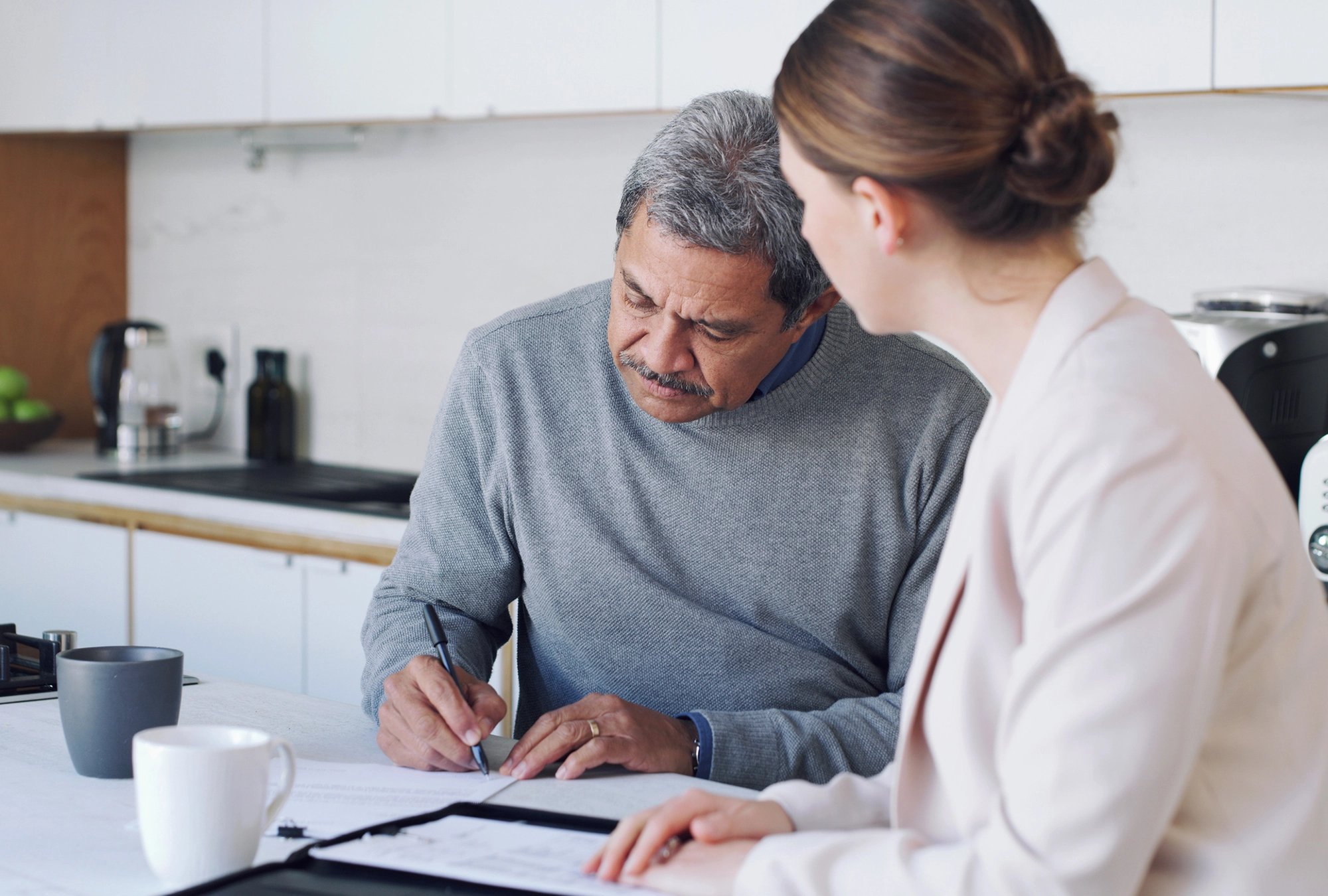 Person Reviewing Essential Estate Planning Documents