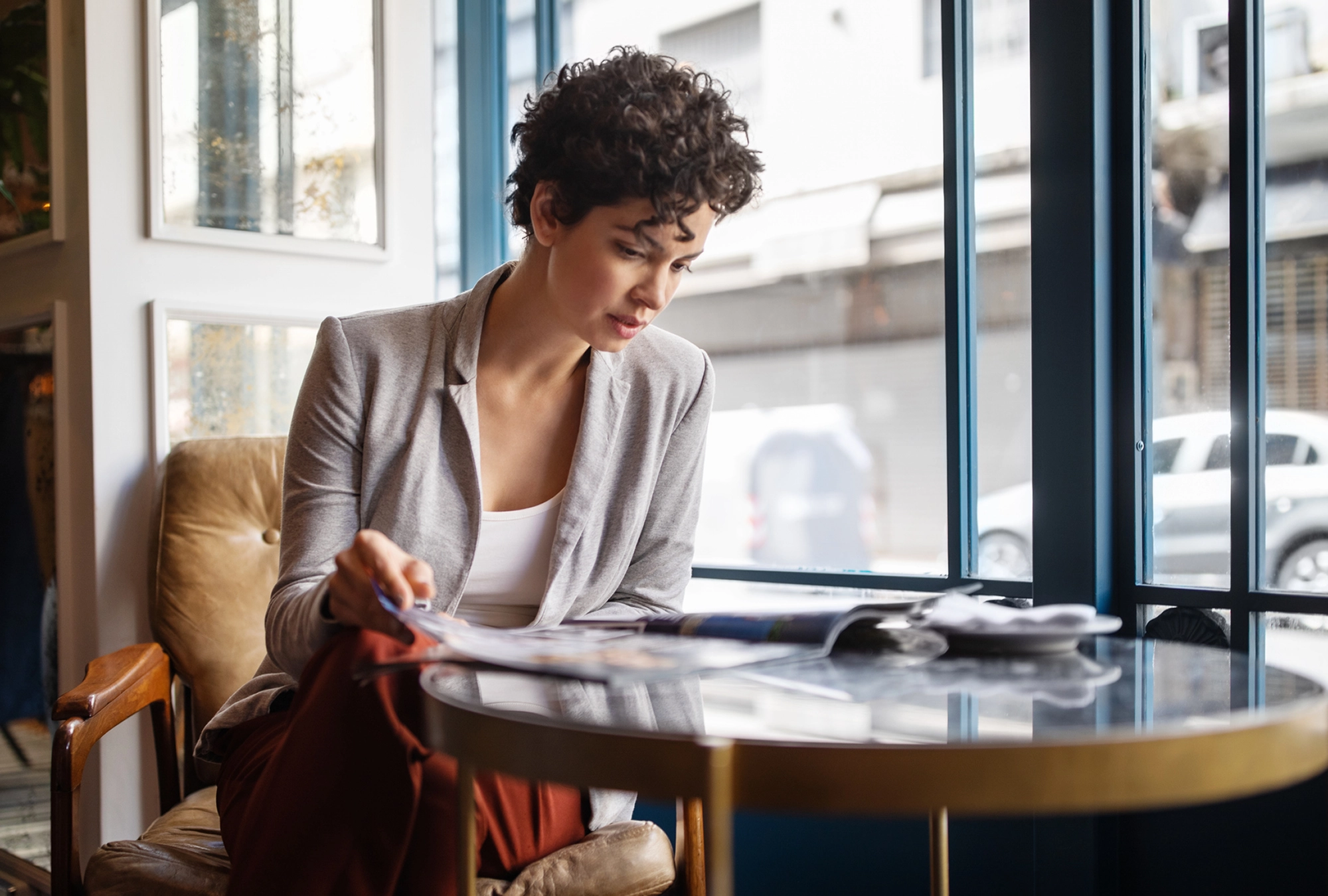 Woman reviewing her portfolio with patience