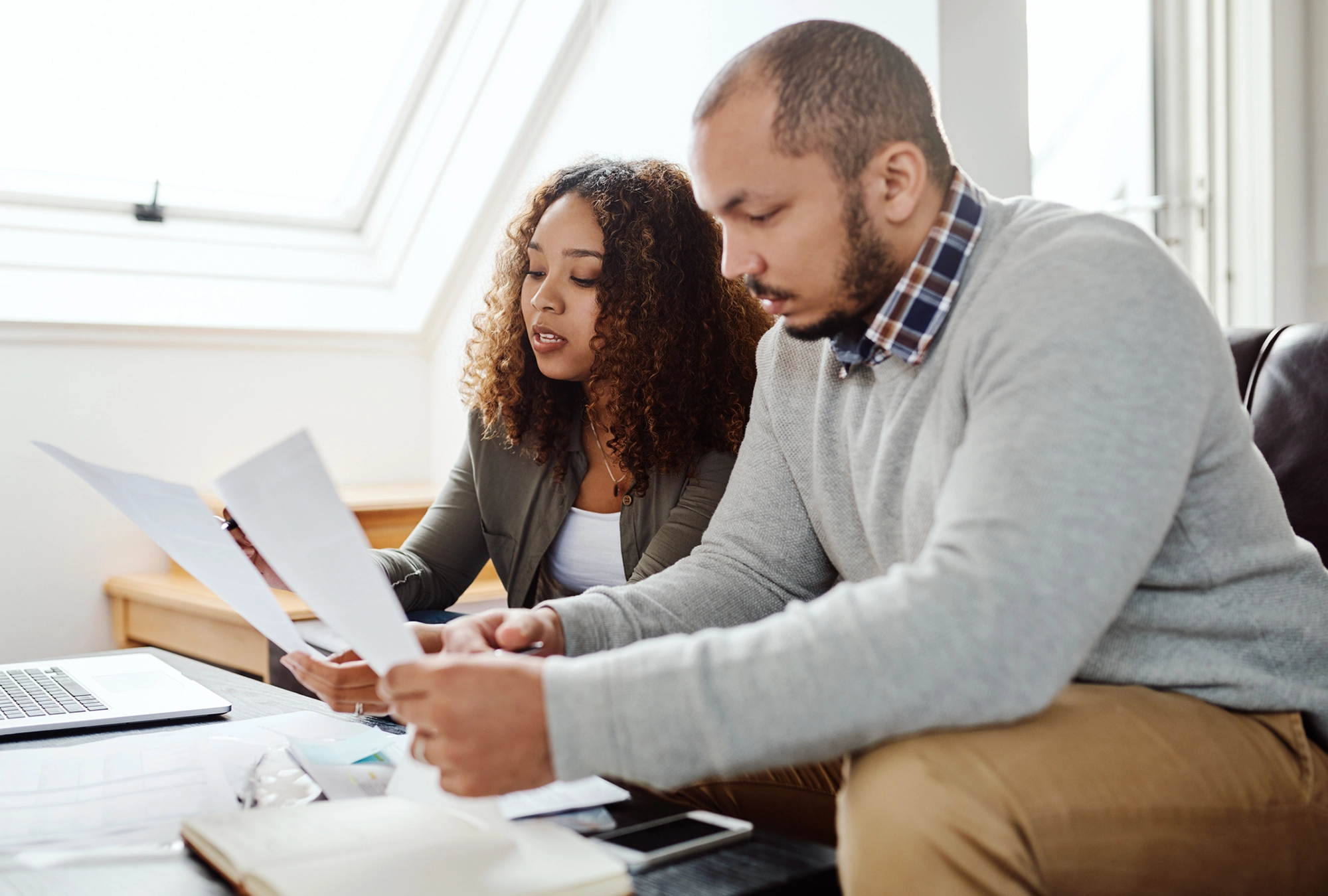 Couple reviewing their year-end financial checklist