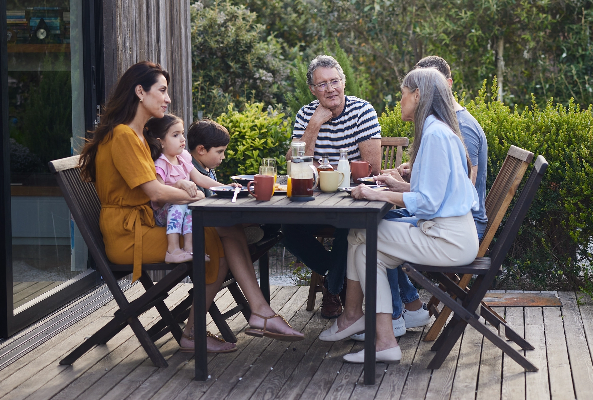 Family Discussing Gifting Parents With Financial Confidence