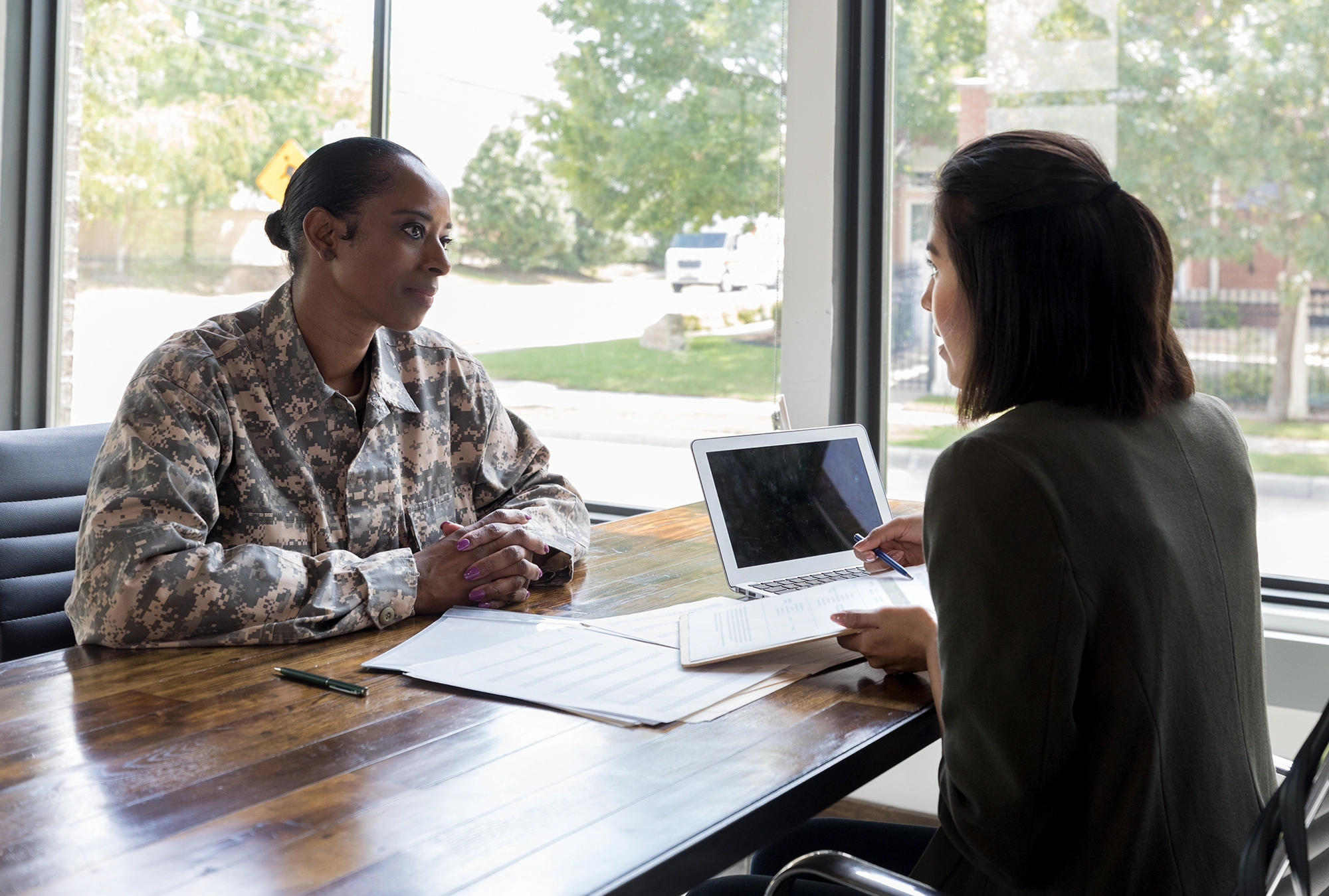 People discussing tax benefits for veterans