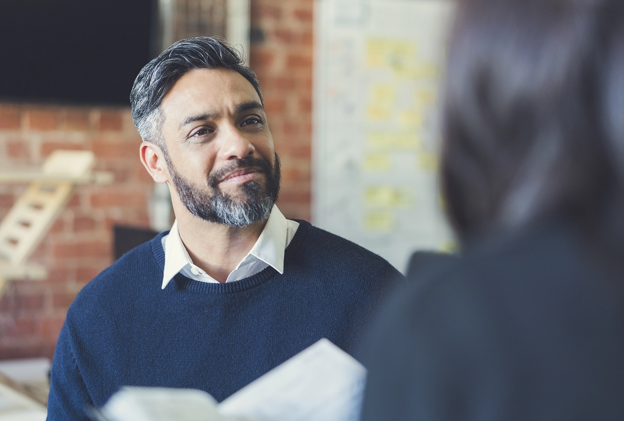 Person discussing private foundation vs donor-advised fund