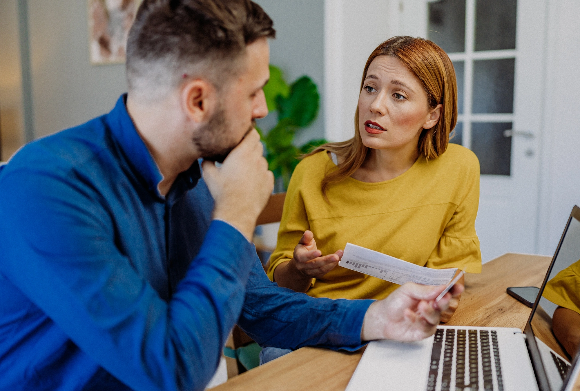 Couple discussing a secret bank account