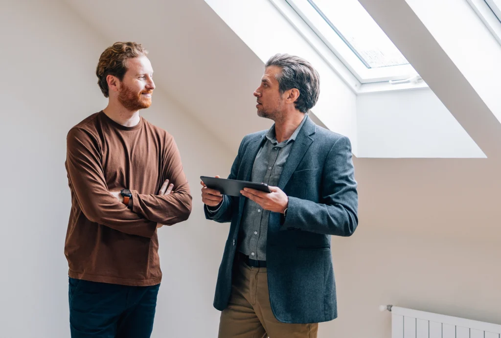 man talking to advisor about insurance options